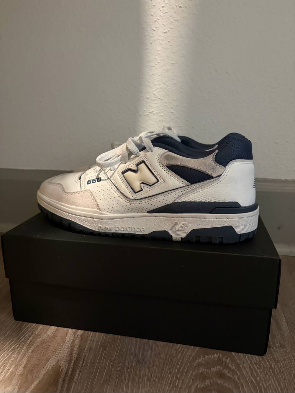 New Balance
White and Navy 550 Sneakers